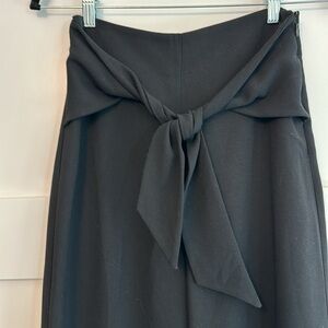 Black cropped culotte pants.